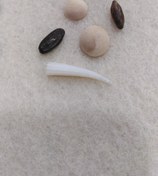 تصویر مهره مار تظمینی همراه با خواندن دعای مخصوص جذب 