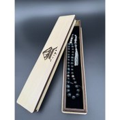 تصویر تسبیح ۳۳ دانه‌ سنگ چشم شاهین اصل 