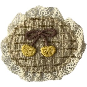 تصویر تکه‌دوزی طرح دایره با گلدوزی قلب 