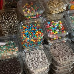 تصویر اسمارتیز، ترافل، شکلات سنگی و مرواریدی مونولیزا 