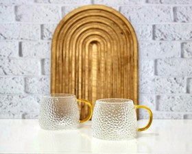 تصویر ماگ پیرکس دسته طلایی خمره ای-ماگ شیشه ای-وارداتی امارات Pyrex mug with golden handle - glass mug - imported from the UAE