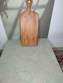 تصویر تخته گوشت دسته دار 