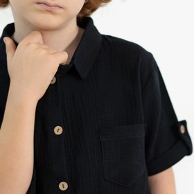 تصویر پیراهن پسرانه مشکی دبل فیس سایز ۴ تا ۱۰ 