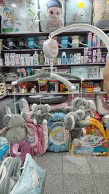 تصویر اویز تخت موزیکال فیل طوسی 