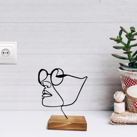 تصویر مجسمه مینیمال طرح دختر 