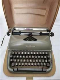 تصویر ماشین تایپ اپتیما در حد نو آلمانی با کیف 