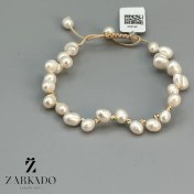 تصویر دستبند طلا و مروارید پرورشی گندمی و گوی البرنادو 