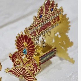 تصویر گهواره فلزی نگین کاری 