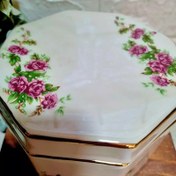 تصویر شکلات خوری سرامیکی بیضی و هشت ضلعی طرح گل سرخی 