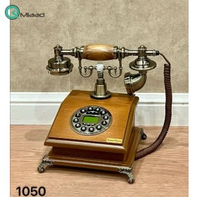 تصویر تلفن گرندفون Grand Phone مدل 1050، تلفن رومیزی کلاسیک با شماره گیر دکمه ای، متریال چوبی تلفن و همچنین دارای کالر آیدی 