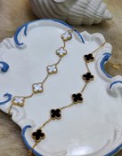 تصویر دستبند ونکلیف مشکی و طلایی 