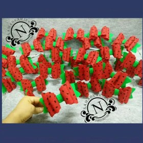 تصویر تل یلدایی با نمد طرح‌دار 