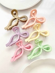 تصویر کلیپس مو طرح پاپیون 