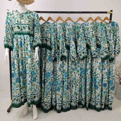 تصویر پیراهن ساحلی سفید با جنس بوگاتی . پارچه خنک تابستانی با بهترین کیفیت ، بدن نما نیست با قد بلند و عرض دامن زیاد 