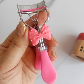 تصویر فرمژه پاپیونی - صورتی کمرنگ 