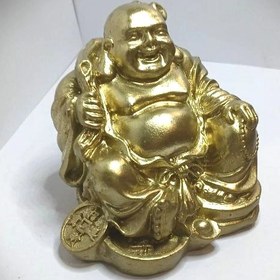 تصویر مجسمه مرد خندان طلایی 