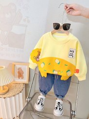 تصویر بلوز تکه دوزی روی آستین و شلوار لی وارداتی - بلوز 