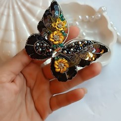 تصویر گل سینه جواهر دوزی پروانه مشکی گلدار 