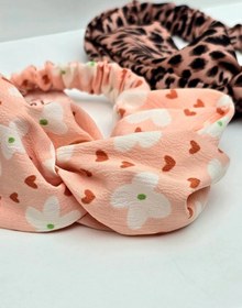 تصویر هدبند گل دار گلبهی 