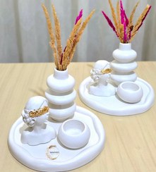 تصویر دکوری با مجسمه دختر 