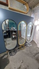 تصویر آینه قدی دکوراتیو مدل پایه گرد بیضی ابعاد ۶۰*۱۸۰ - مشکی 