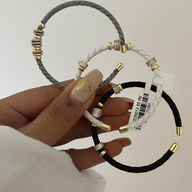 تصویر دستبند چرمی توپی 