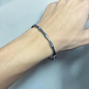 تصویر دستبند بنگل استیل طرح استخونی 