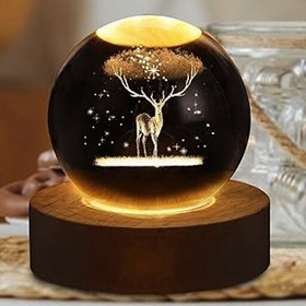 تصویر گوی کریستالی چراغدار طرح گوزن 8 سانتی ا Illuminated crystal ball with deer design, 8 cm Illuminated crystal ball with deer design, 8 cm