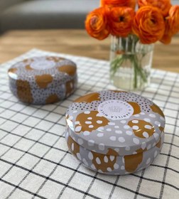 تصویر قوطى فلزى گرد 