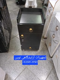 تصویر ترولی آرایشگاهی چوبی دررنگ بندی سفید ومشکی کپی 