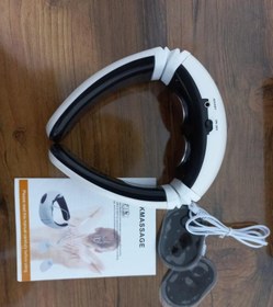 تصویر تنس گردن همراه با پد چسبی باتری خور 