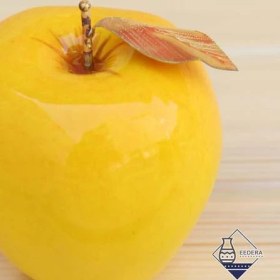 تصویر سیب زرد سرامیکی 