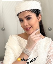 تصویر کلاه پیلباکس مدل گل پیونی با دیزاین پر _مشکی 