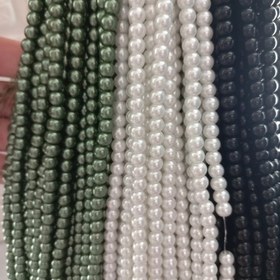 تصویر مروارید سنگی رنگ مشکی ،سایز6،بصورت ریسه ای 144 عددی 