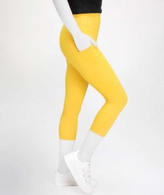 تصویر لگینگ زنانه ورزشی کمر پهن برمودا مدل 24124 زرد آگی 