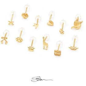 تصویر پیرسینگ طلا طرح دار 