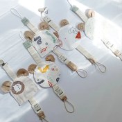 تصویر بند پستونک کیف دار طرح‌دار - نیم دایره‌ای 