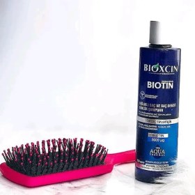 تصویر شامپو ضد ریزش بیوکسین حاوی بیوتین (Biotin) - تقویت کننده و ضخیم کننده مو واردات قانونی ارسال از منطقه آزاد ارس 