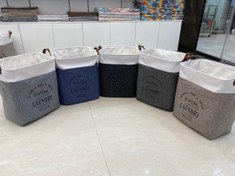 تصویر سبد رخت چندمنظوره دایره و مربع پارچه‌ای جادار و مقاوم برای لباس و لوازم - دایره 