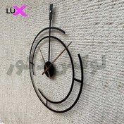 تصویر ساعت دیواری فلزی طرح خاص - طلایی ا Vip metal wall clock Vip metal wall clock