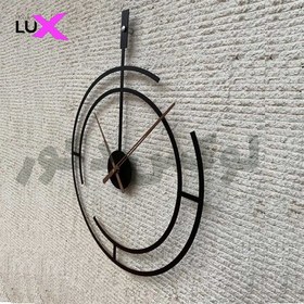 تصویر ساعت دیواری فلزی طرح خاص - طلایی Vip metal wall clock