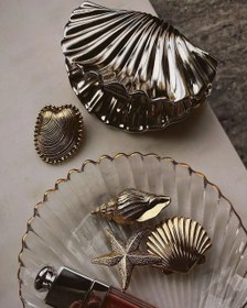 تصویر کلیپس صدفی مجلسی سایز بزرگ و کوچک در رنگ های نقره ای، طلایی و بژ 