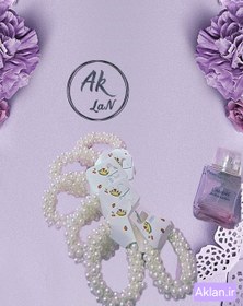 تصویر کش مو مرواریدی 