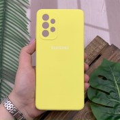 تصویر قاب گوشی Galaxy A73 5G سامسونگ سیلیکونی پاک کنی اورجینال داخل پارچه ای محافظ لنز دار رنگ زرد کد 39586 