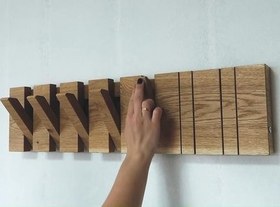 تصویر چوب لباسی متحرک دیواری 