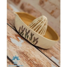 تصویر آب پرتقال گیری سفالی 