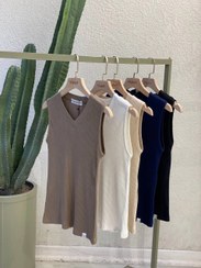 تصویر تاپ زنانه یقه هفت کبریتی سایز ۴۲ تا ۵۰ 