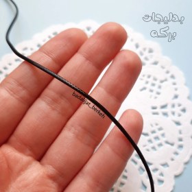 تصویر بند چرمی مشکی متری 