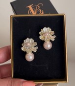 تصویر گوشواره گل با مروارید صورتی 