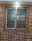 تصویر پنجره گره چینی چوبی شمسه ۱۳۸در۱۳۲ 